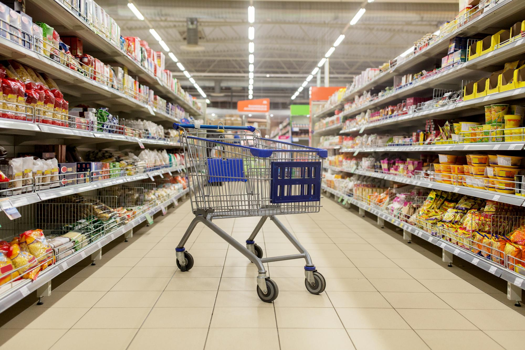 Supermarket aisle representing retail and consumer packaged goods